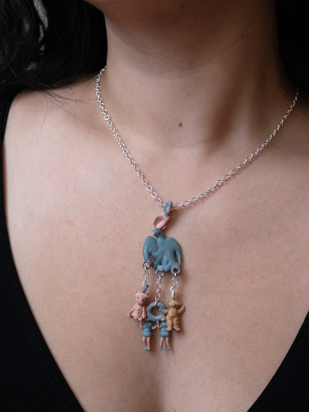Eagle, Bears, Twins necklace worn
