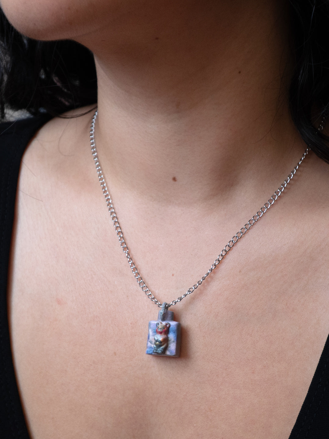 Potion Bear necklace worn