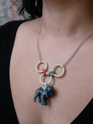Rubber Dog necklace worn