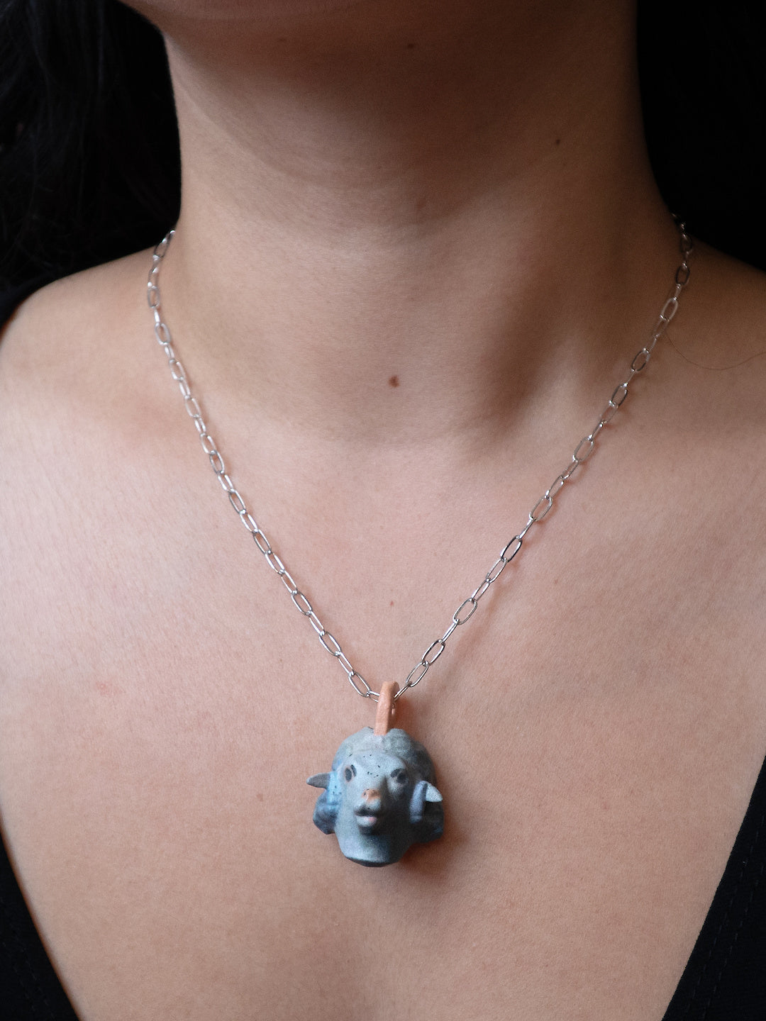 Wolf in Sheeps necklace worn