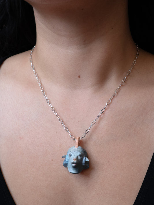 Wolf in Sheeps necklace worn